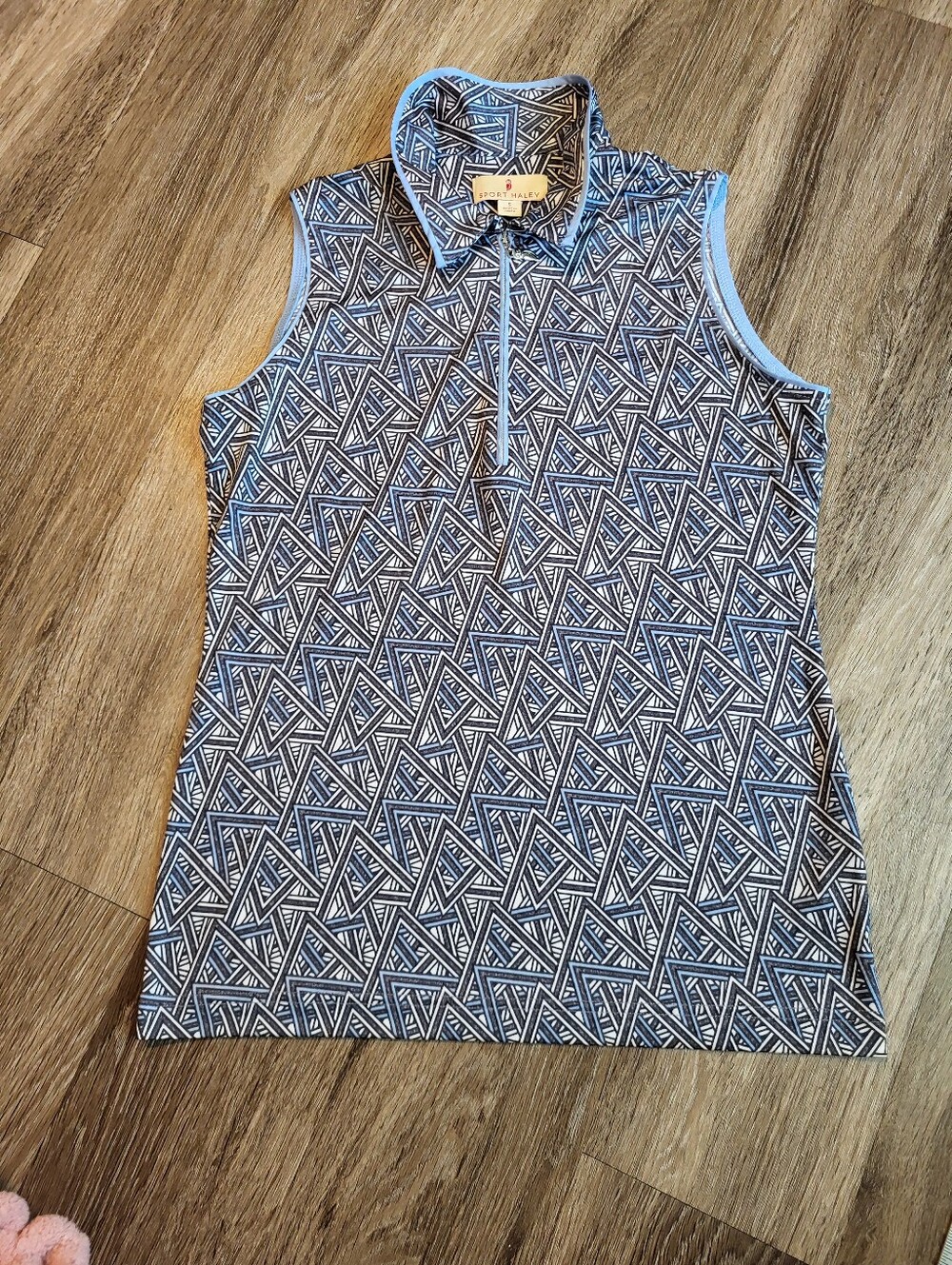 Sport Haley Blue Geometric Sleeveless Zip Polo Top